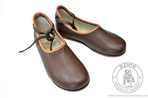 Viking children's shoes. Medieval Market, a pair of leather shoes made from an elastic and soft cowhide